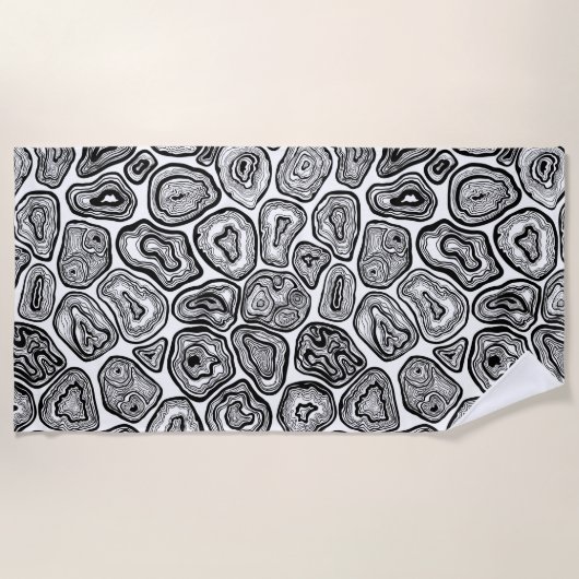 Afsnijdsels in zwart-wit strandlaken (Voorkant)