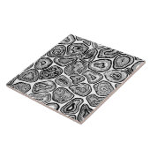 Afsnijdsels in zwart-wit tegeltje (Zijkant)