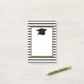 Afstuderen met zwarte en goudglitter post-it® notes (Op bureau)