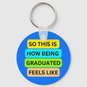 Afstuderen ronde lichtblauwe sleutelhanger SO_THIS (Voorkant)