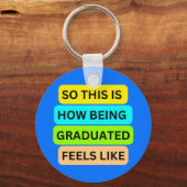 Afstuderen ronde lichtblauwe sleutelhanger SO_THIS (Voorkant)