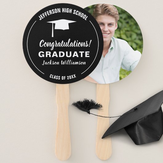 Afstuderen voor je schoolkleur Afstuderen Foto Handwaaier