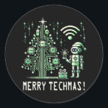 AI-robot met Tech Christmas Tree - Vrolijke Techma Ronde Sticker<br><div class="desc">Vier de feestdagen met een technische twist! Dit ontwerp is voorzien van een AI-aangedreven robot die naast een futuristische kerstboom staat die is gemaakt van circuits en chips. Perfect voor tech liefhebbers en degenen die graag combineren vakantie geest met cutting-edge technologie.</div>