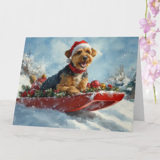 Airedale Hond in Sledge Laat het Sneeuw Kerstmis Kaart (Orchidee)