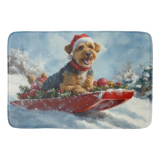 Airedale-hond in slee laat het sneeuwen Kerstmis Badmat (Voorkant)