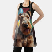Airedale-hond met cake en ballonnen schort (Insitu)
