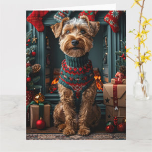 Airedale hond met kerstcadeaus open haard kaart