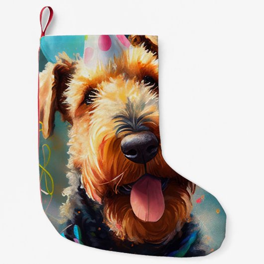 Airedale hond met verjaardagscadeau en pet kleine kerstsok (Voorkant)