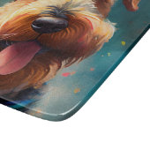 Airedale hond met verjaardagscadeau en pet snijplank (Hoek)