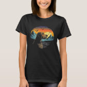 Airedale Terrier Dog and Sun Rising Over Mountains T-shirt (Voorkant)