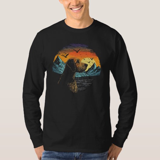 Airedale Terrier Dog and Sun Rising Over Mountains T-shirt (Voorkant)