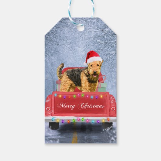 Airedale Terrier Dog in Snow, met Kerstmis Cadeaulabel (Voorkant)