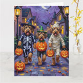 Airedale Terrier Dogs Trick-or-Treating Halloween Kaart (Gele Bloem)