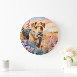 Airedale Terrier-hond in een bloemenweide Grote Klok