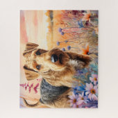 Airedale Terrier-hond in een weide met wilde bloem Legpuzzel (Verticaal)