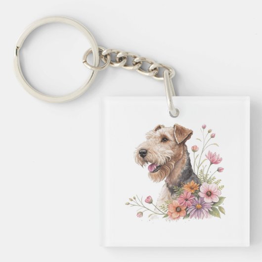 Airedale-terriër met bloemen sleutelhanger (voorkant)