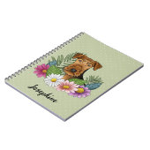 Airedale Terrier met kleurrijke bloemen en naam Notitieboek (Linkerzijde)