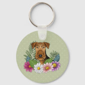 Airedale Terrier met kleurrijke bloemen en naam Sleutelhanger (Voorkant)