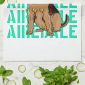 Airedale terriër zitten theedoek (Gevouwen)