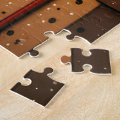 Akita-hond met kerstcadeaus bij de open haard legpuzzel (Zijkant)