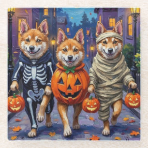 Akita-honden gaan langs de deuren in Halloween-kos Glazen Onderzetter