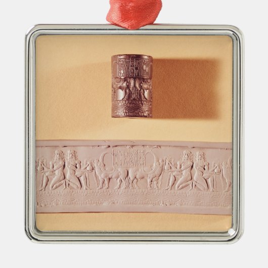 Akkadische cilinderverzegeling en indruk metalen ornament (Voorkant)