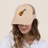 Akoestische  gitaar met aangepaste muzikant trucker pet (In situ)