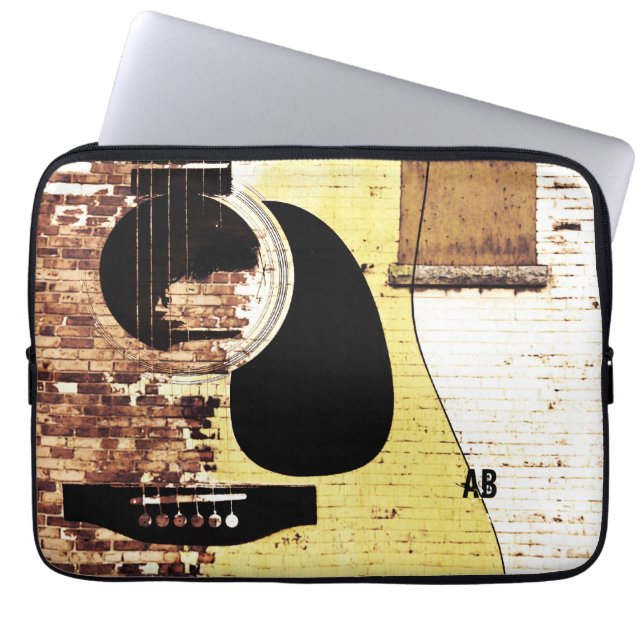 akoestische gitaar op baksteencollage laptop sleeve (Voorkant)