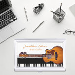 Akoestische gitaar piano toetsen muziek leraar visitekaarthouder<br><div class="desc">Schijn professioneler en houd uw visitekaartjes in ongerepte staat op hetzelfde moment met dit elegante zwart-wit modern visitekaartjes hoesje met gitaar & pianokleutels voor diegenen wiens passie of/en beroep muziek is. Ideaal voor muziekleraar, muzikanten of elke muziekliefhebber. U kunt het aanpassen en de naam en het beroep van uw of...</div>