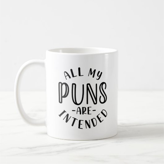 Al mijn puns zijn bedoeld koffiemok (Links)