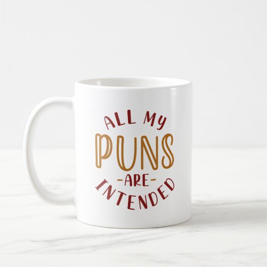 Al mijn puns zijn bedoeld koffiemok (Links)