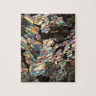 Alanineaminozuur onder microscoop legpuzzel