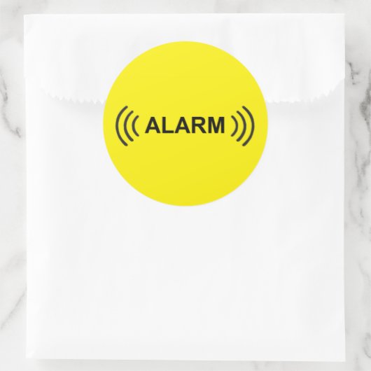 ALARM RONDE STICKER (Tas)