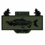 Alaska Combat Fisherman Badge Fotobeeldje Magneet<br><div class="desc">Op basis van een gemeenschappelijke militaire prijs herdenkt de Combat Fisherman Badge de gevechtsvisserij in Alaska. Een zwarte lijntekening, "subdued" versie van de full-color Combat Fisherman Badge. Het kenmerkt een Zalm van Sockeye over een konifertak woede. De tekst "ALASKA"wordt gevestigd bij de bovenkant van het afbeelding. Zalmvisserij is bijzonder populair...</div>