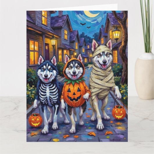 Alaskan Malamute Dogs Trick-or-Treating Halloween Kaart (Voorkant)