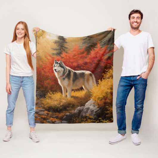 Alaskan Malamute in herfstbladeren val geïnspiree Fleece Deken (In situ)