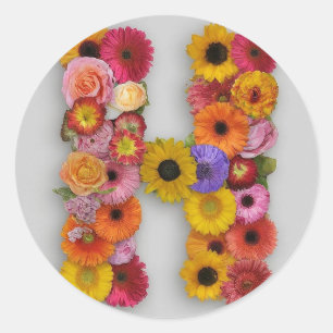 Alfabet H in bloemen Ronde Sticker