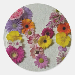 Alfabet M in bloemen Ronde Sticker