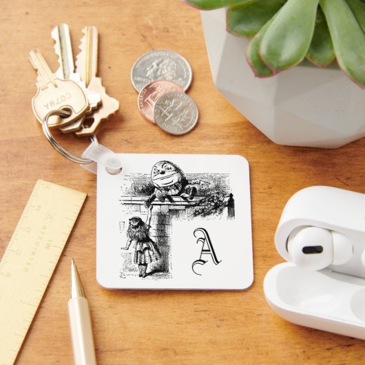  Alice in Wonderland, pompoen tegen de muur Sleutelhanger (Bureau)