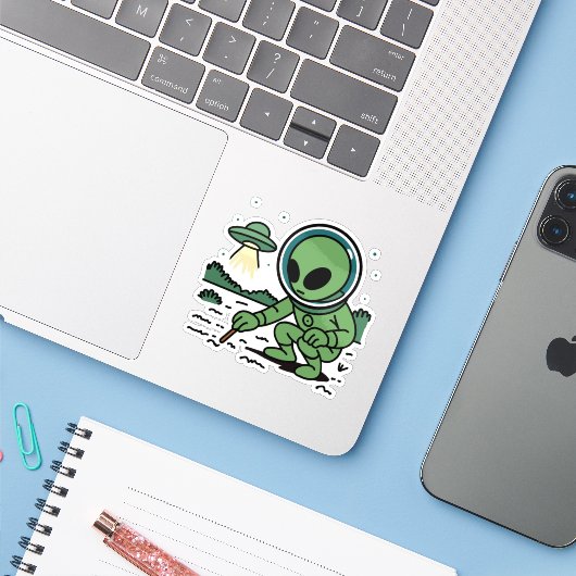 Alien Melancholy Sticker (Laptop met iPhone)