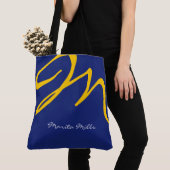 all-over-print blauwe canvas tas met geel initiaal (Dichtbij)