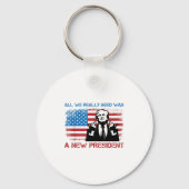 All We Really Needed Was A New President - Funny T Sleutelhanger (Voorkant)