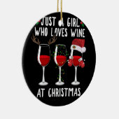 Alleen een meisje dat met kerst van wijnglas houdt keramisch ornament (Rechts)