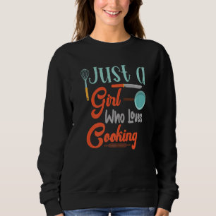 Alleen een meisje dat van het koken van geweldige trui