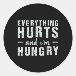 Alles doet pijn en ik heb honger ronde sticker