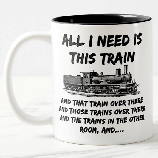 Alles wat ik nodig heb is deze stoomtrainmotor en  tweekleurige koffiemok