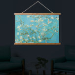 Almond Blossom | Vincent Van Gogh Hangend Wandkleed<br><div class="desc">Amandelbloesems (1890) van Vincent van Gogh (1853-1890). Van Goghs schilderij Amandelbloesems toont delicate witte bloemen tegen een levendige turquoise hemel, die nieuw leven en vernieuwing symboliseert. Geïnspireerd door de Japanse kunst, creëer de elegante takken en vloeiende lijnen een gevoel van sereniteit en natuurlijke schoonheid. De getextureerde penseelstreken en heldere, harmonieuze...</div>