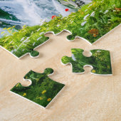 Alpenhuisje bij bergwaterval legpuzzel (Zijkant)