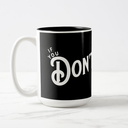 Als je niet stopt... win je. tweekleurige koffiemok (Links)