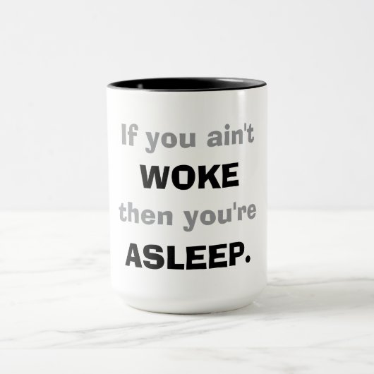 "Als je niet wakker bent, dan slaap je." Mok (Midden)